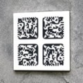 QR-Codes auf Grabsteinen